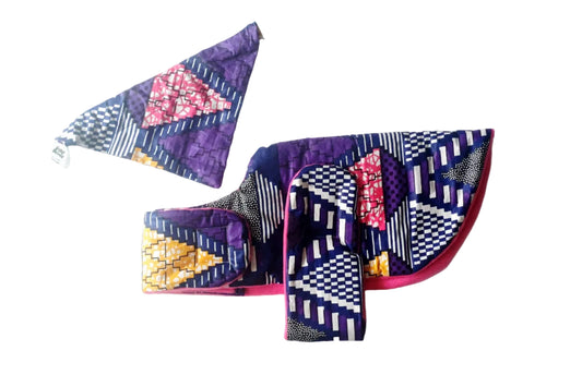 Colourful dog coat and bandana with geometric patterns on a white background