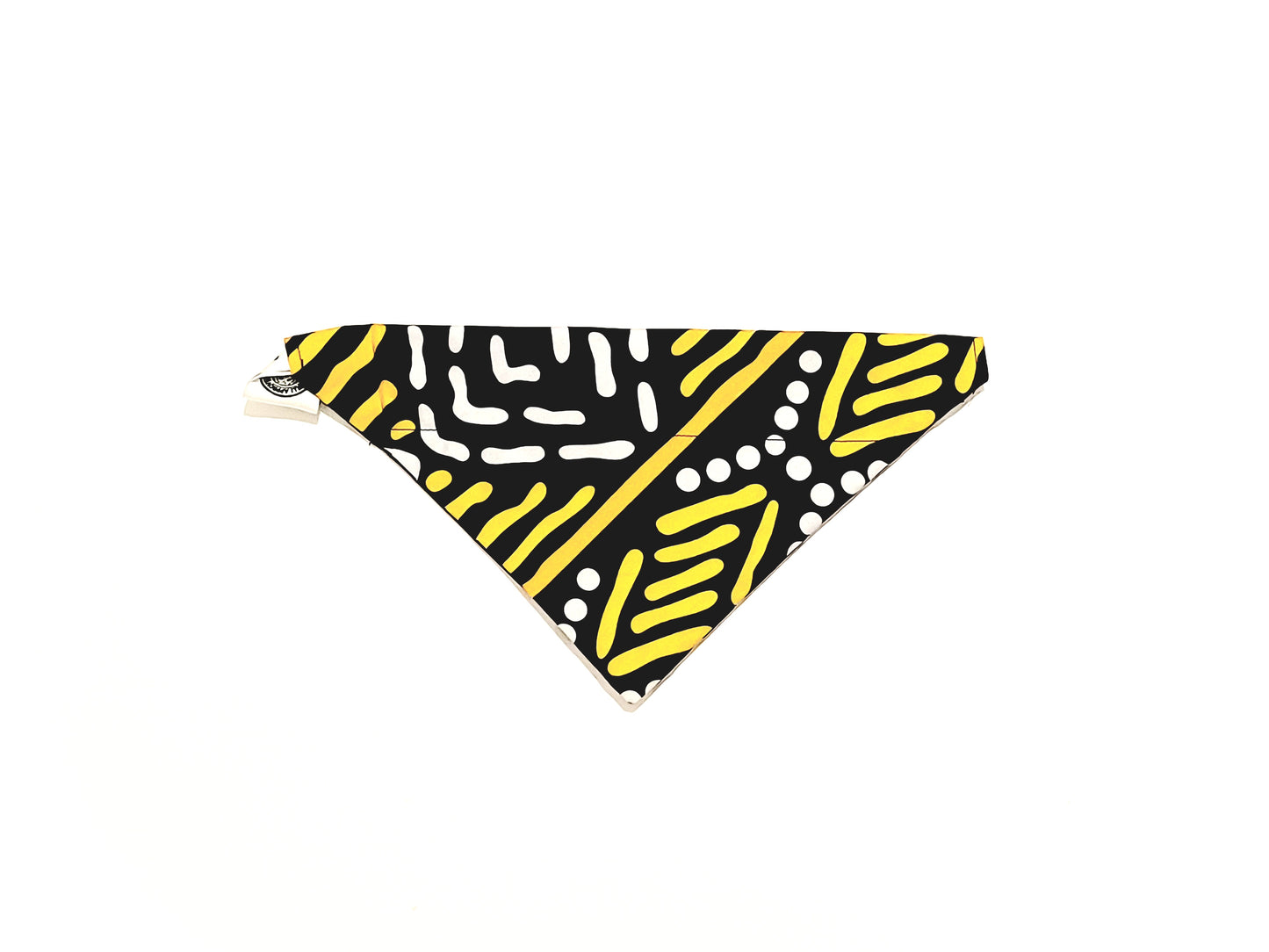 Black bandana with yellow and white patterns on a white background
