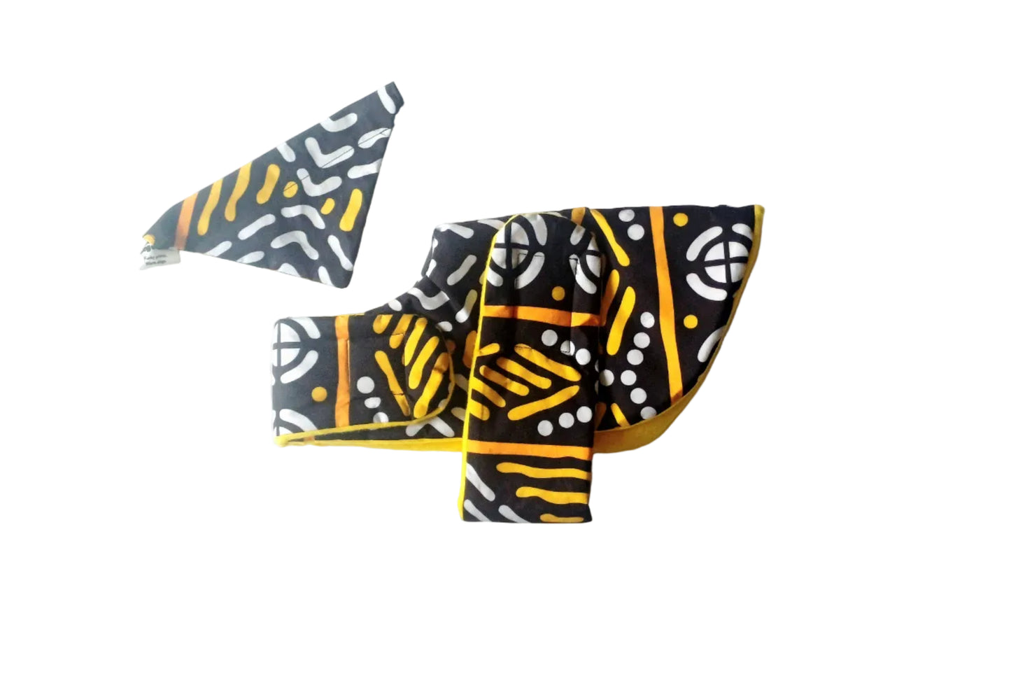 Dog coat and bandana with geometric patterns on a white background