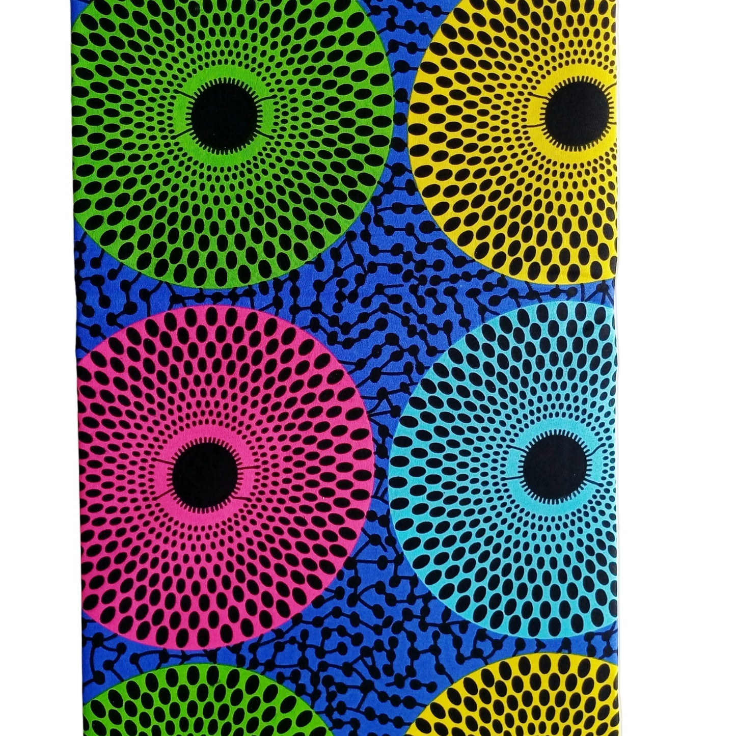 Colourful abstract pattern of concentric circular dots in pink, green, yellow, and blue on a dark blue background.