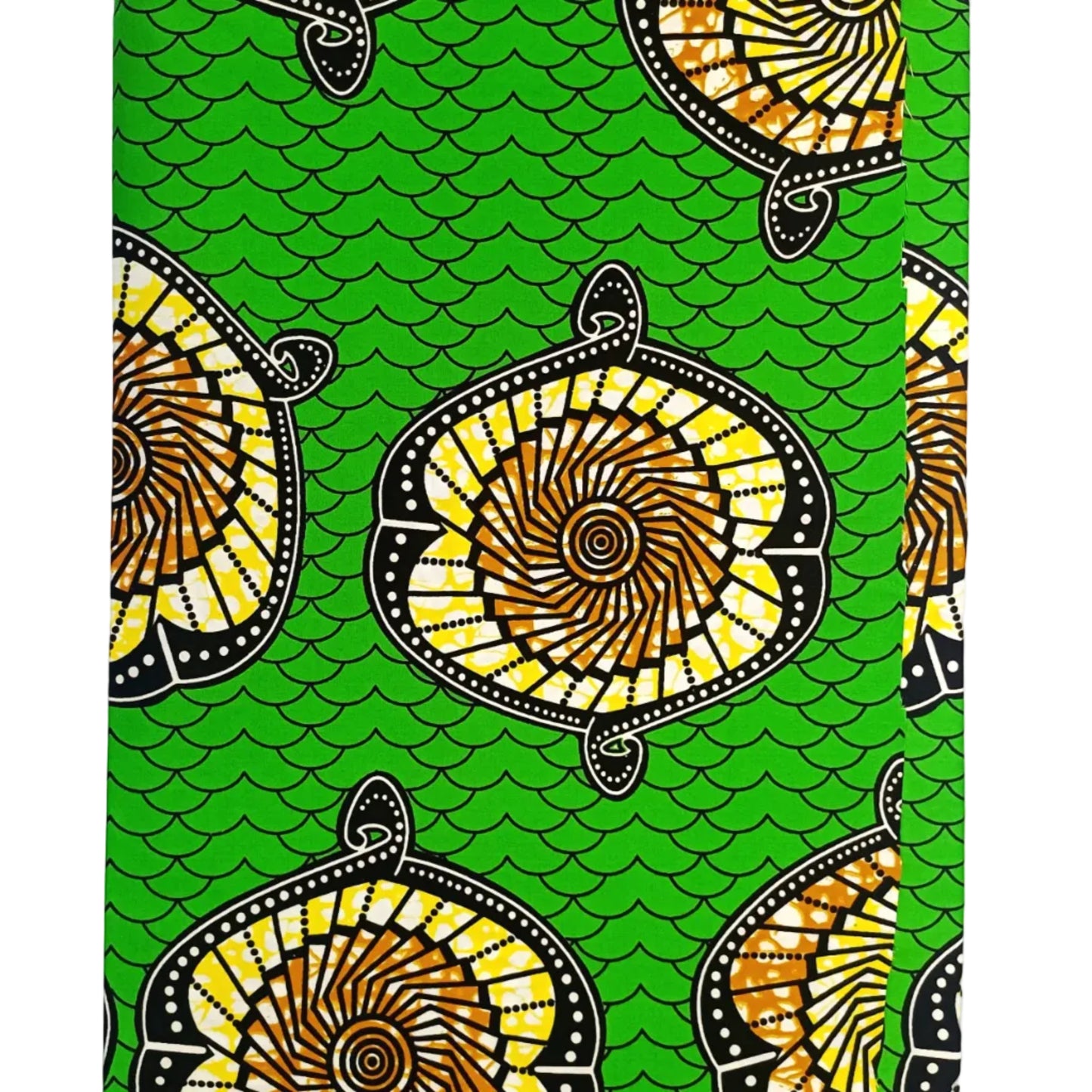 Traditional patterned fabric with yellow and black designs on a green background