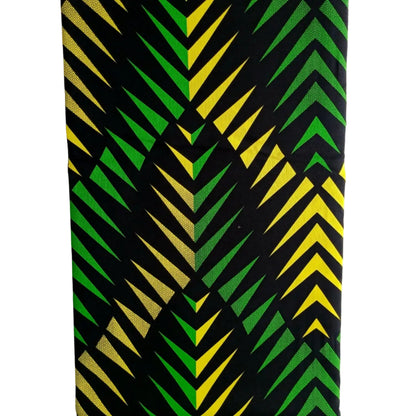 Bold geometric chevron pattern in black, green, and yellow.