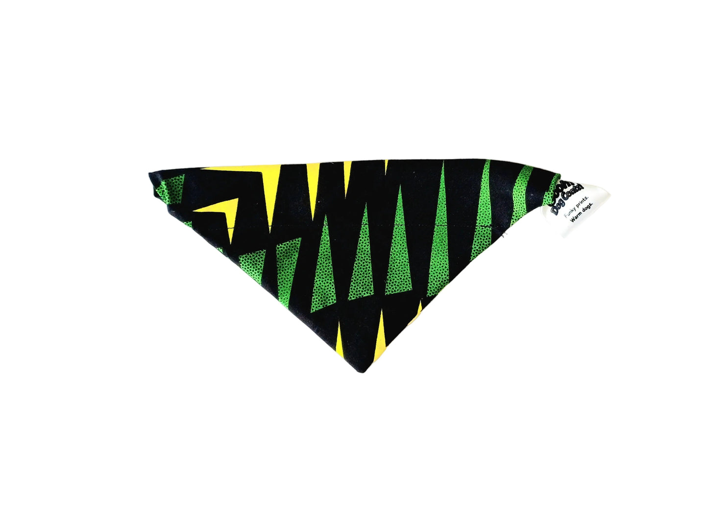 A triangular pet bandana with a black, green, and yellow geometric pattern, laid flat on a white background.