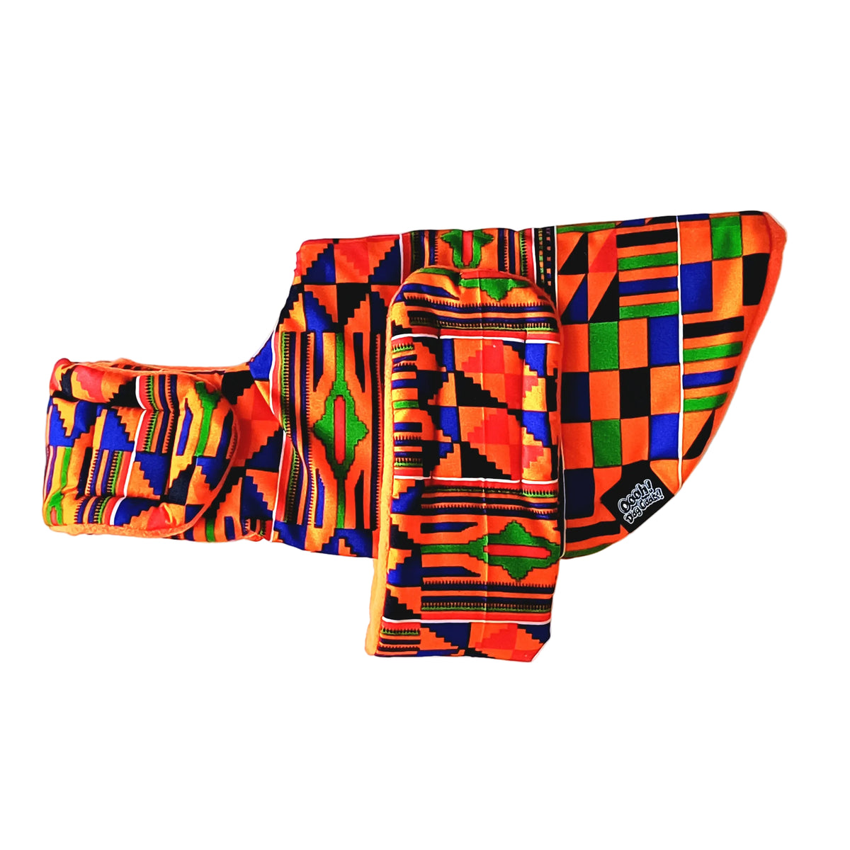 A colorful dog coat featuring a vibrant African Kente pattern with geometric designs in orange, green, blue, yellow, and black, laid flat on a white background.