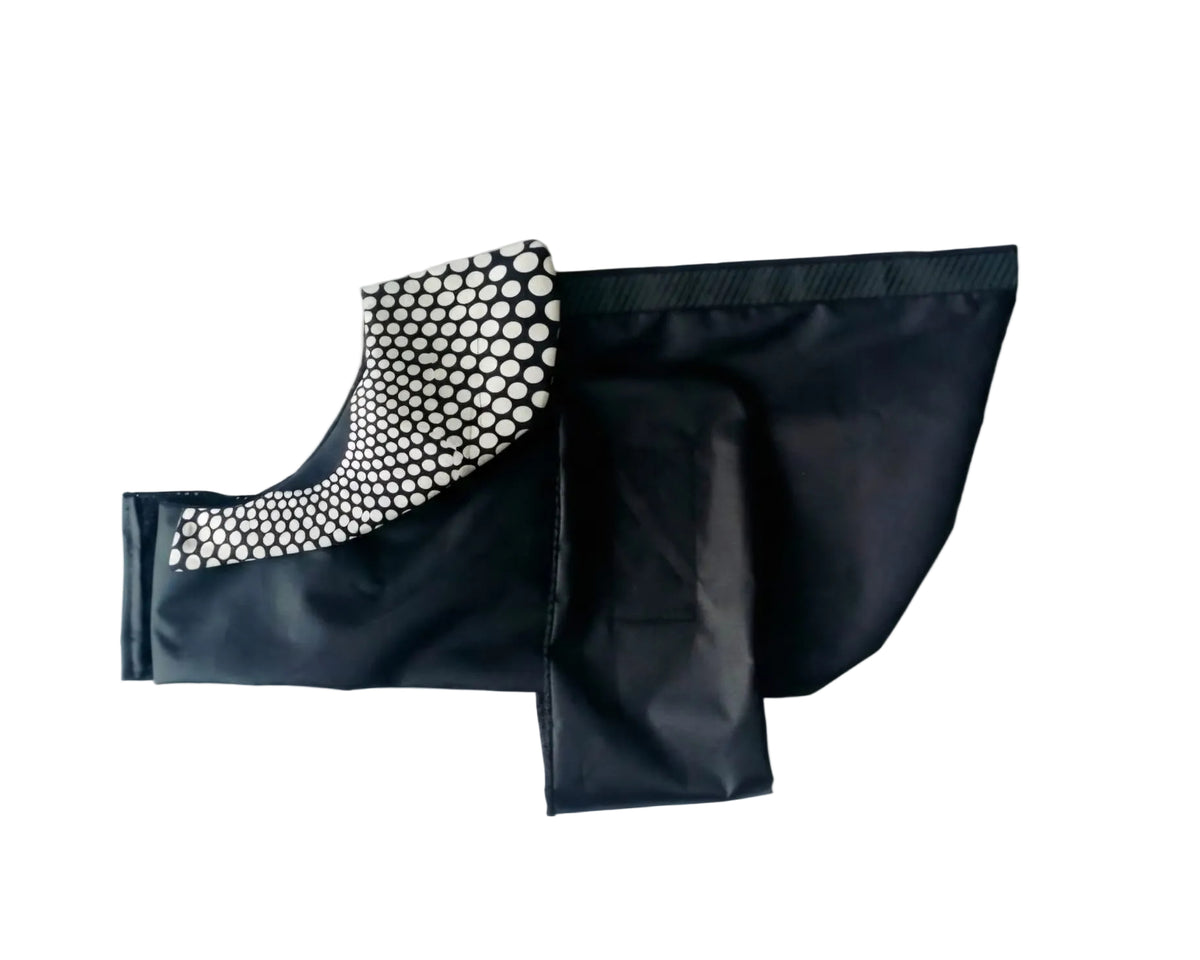 Black dog raincoat with Black and White polka dot collar