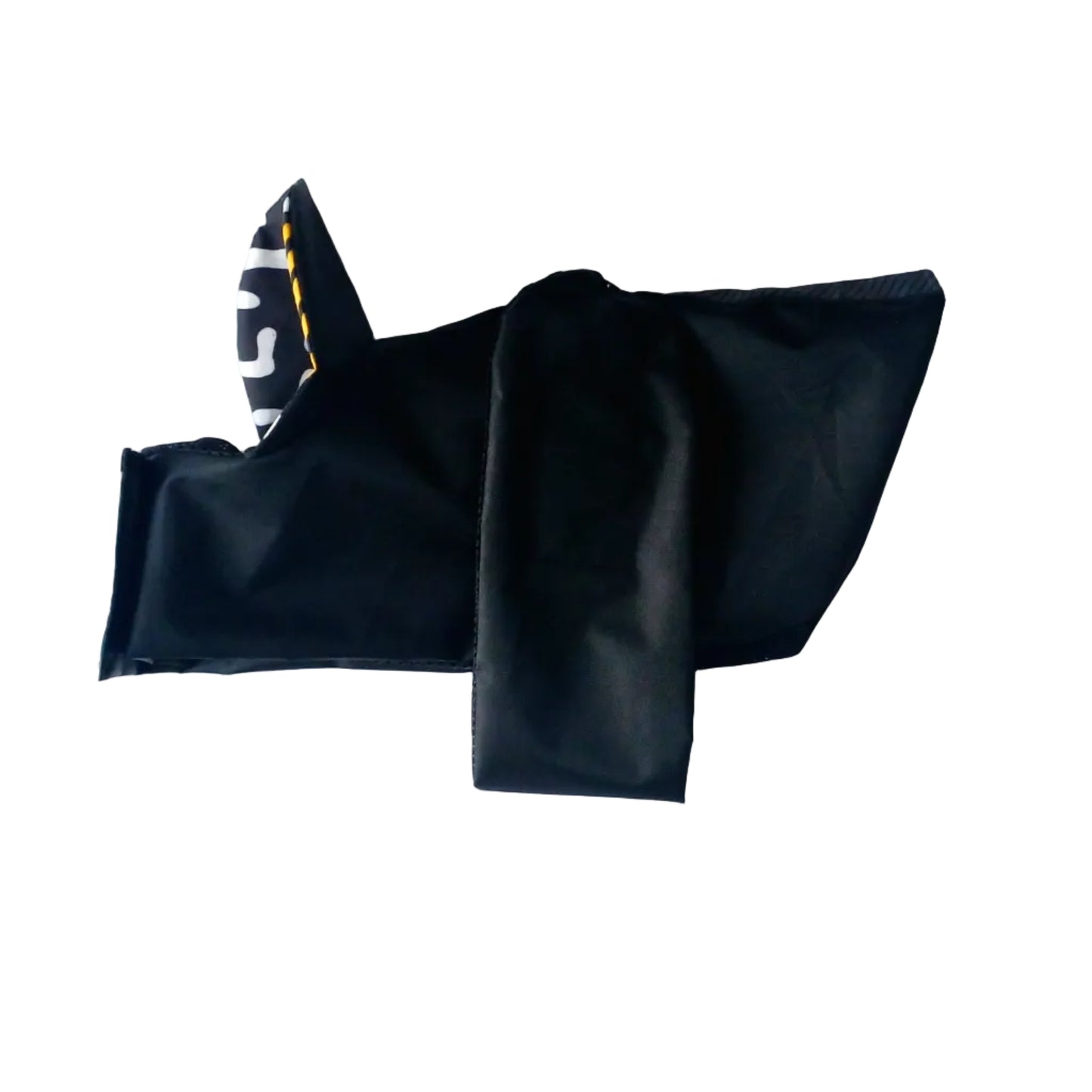A black small dog raincoat, featuring a white and black patterned corner with yellow stitching, laid flat on a white background.