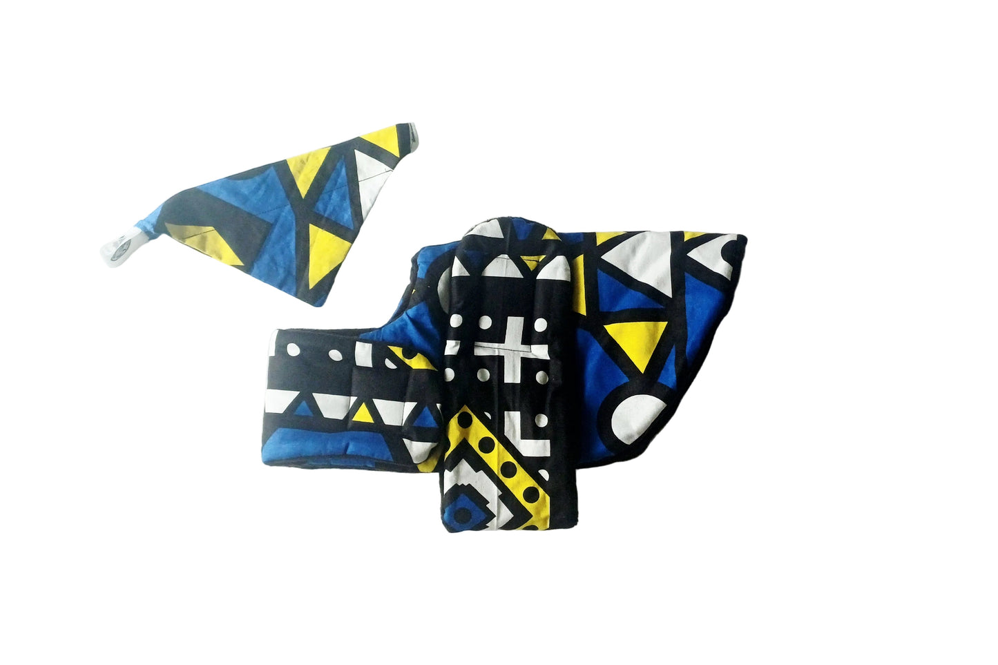 Colourful geometric-patterned dog  coat and bandana on a white background