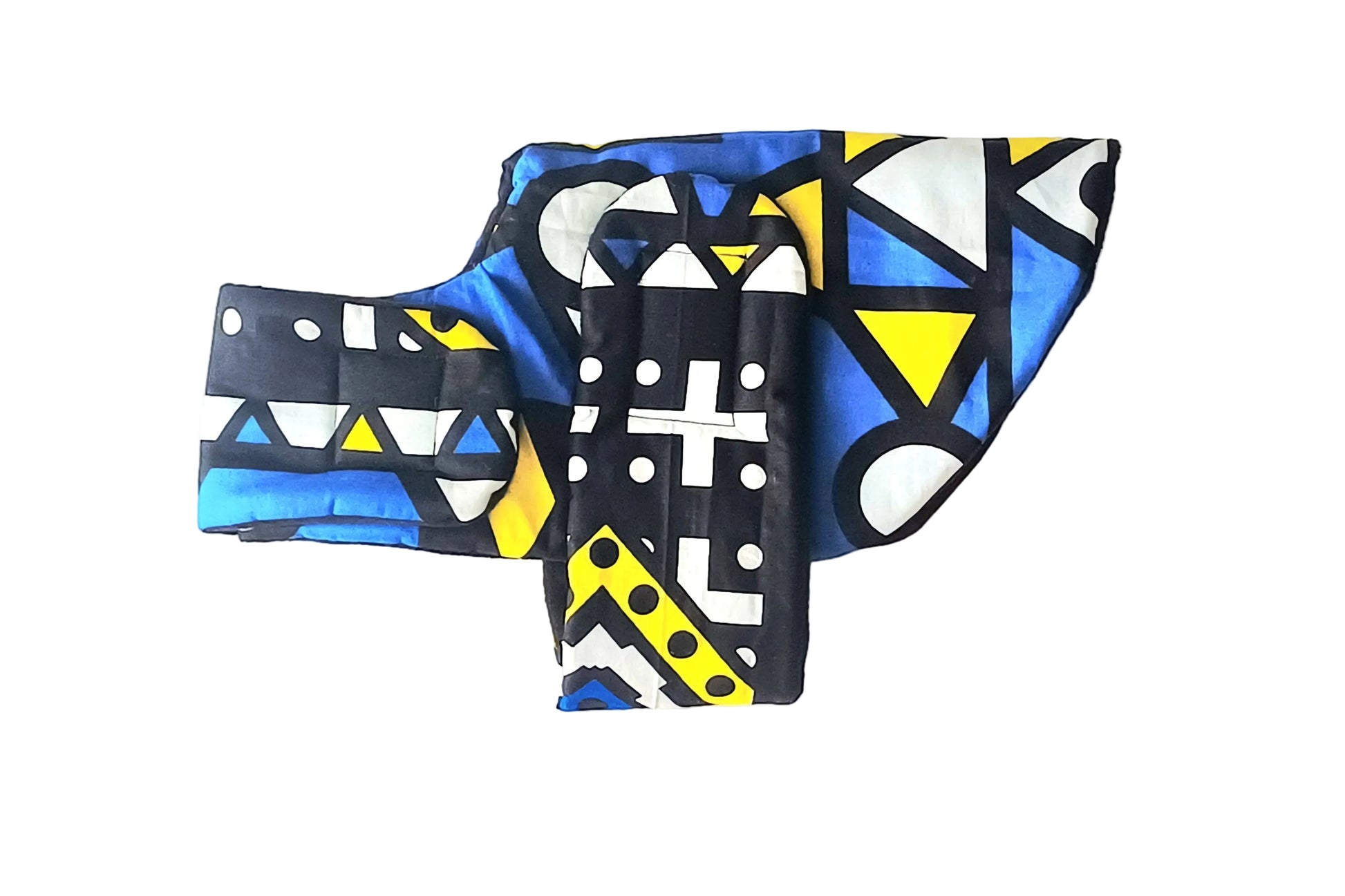 Colourful patterned dog coat on a white background