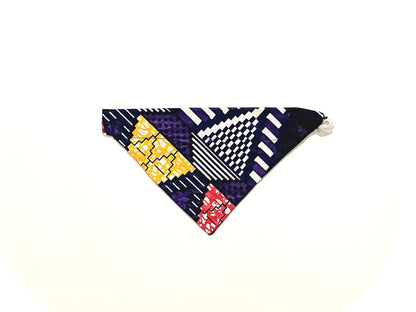 Colorful geometric patterned bandana on a white background