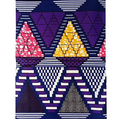 Geometric patterned fabric with triangles in purple, yellow, and pink on a white background