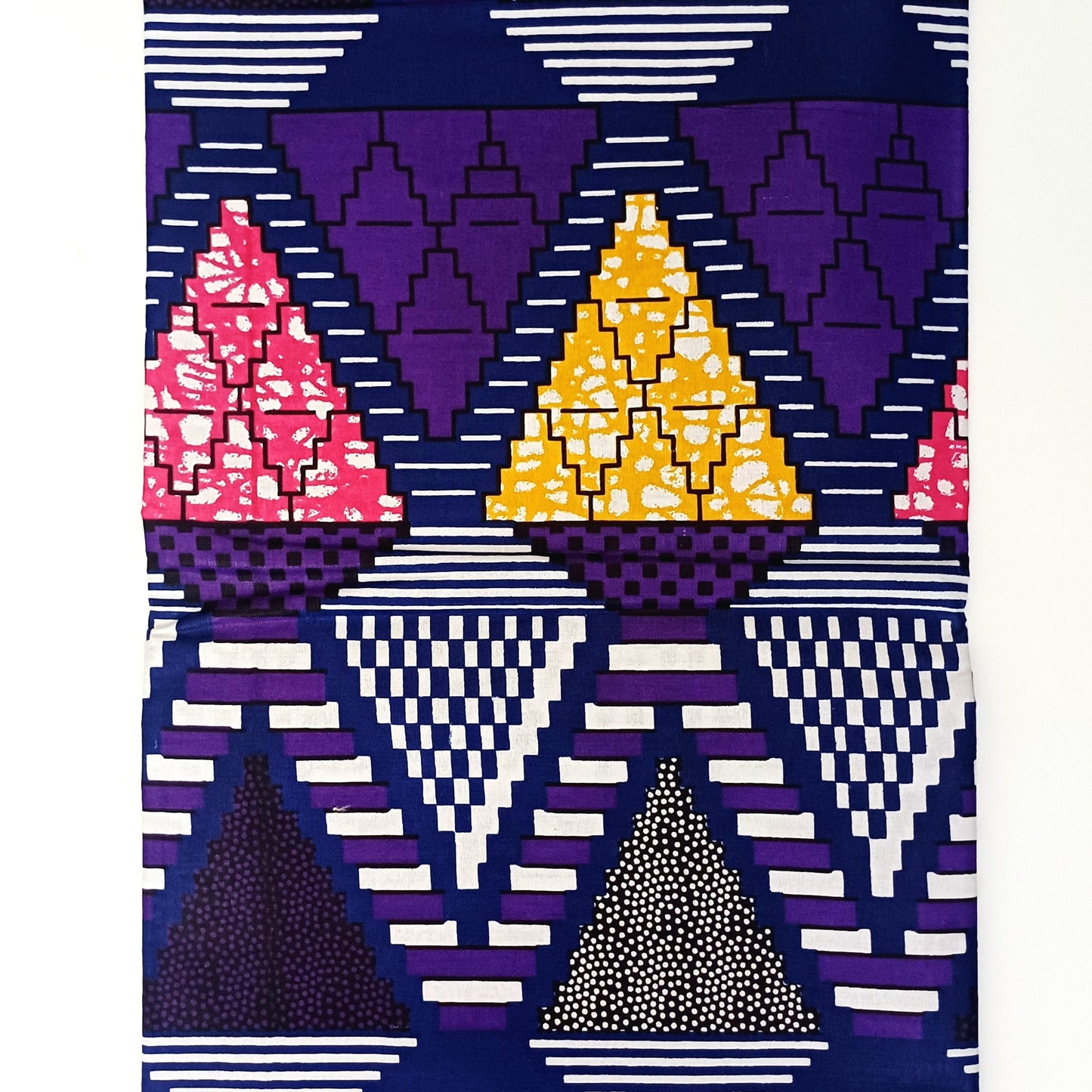 Geometric patterned fabric with triangles in purple, yellow, and pink on a white background